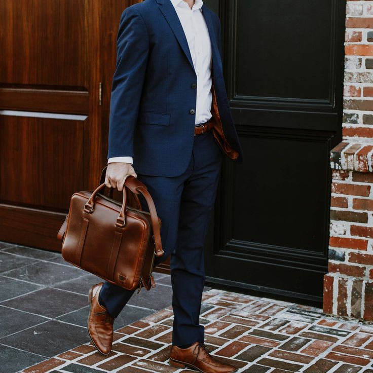 Men's leather work bags from the Executive collection, designed for the professional with a sophisticated and functional style