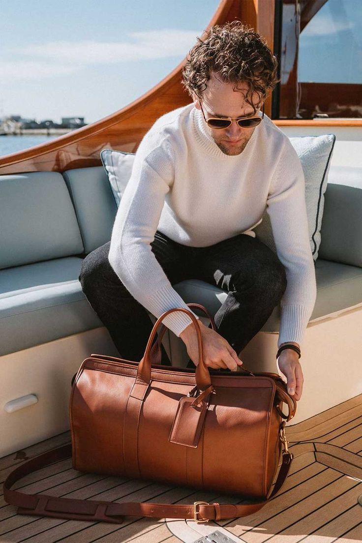 Men's weekend bags from the Explorer collection, crafted with luxury leather for stylish and practical travel